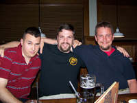 A picture of James, Jeremiah, and me at Outback in Gainesville